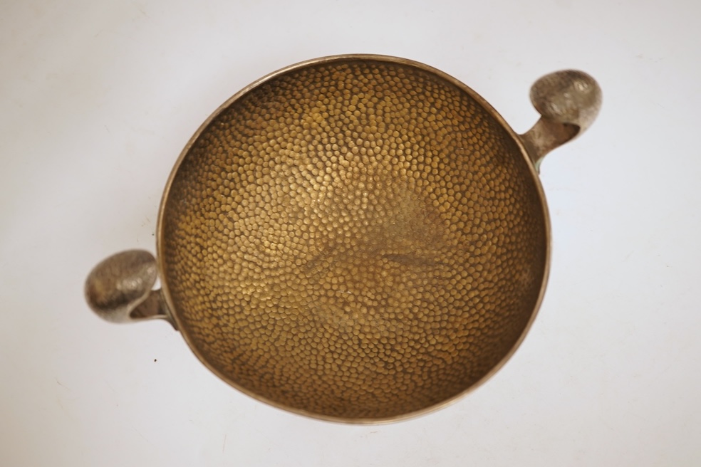 A hammered white metal two handled pedestal bowl, stamped 'Kennedy 925, diameter 18.9cm, 18.1oz.